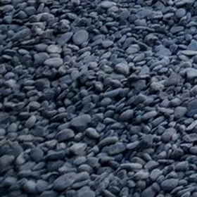 Close-up of small gray river rock